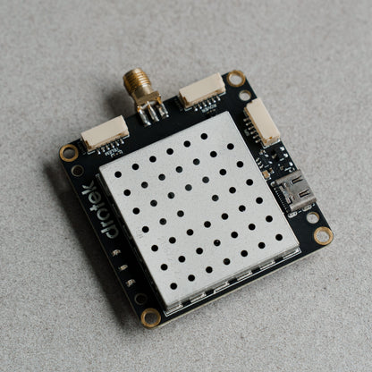 Siderion DP0601 ZED-F9P RTK GPS module on a gray background. Top isometric view.