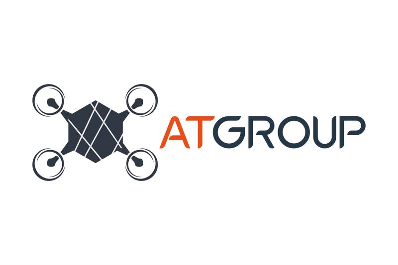 ATGROUP logo featuring a dark gray drone graphic and orange and dark gray text on a white background.